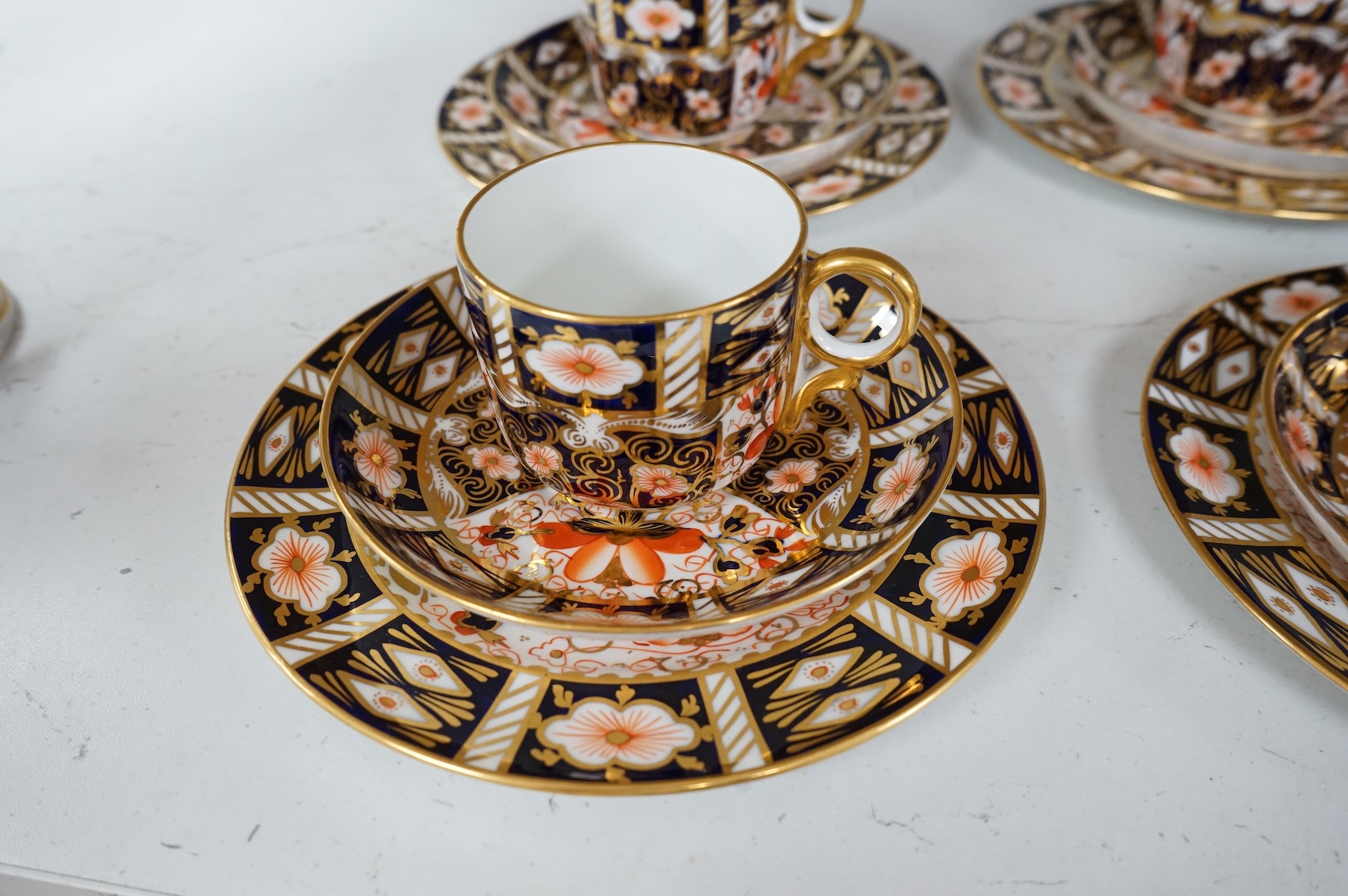 A Royal Crown Derby Imari pattern part tea service to include trios, bowl and jug